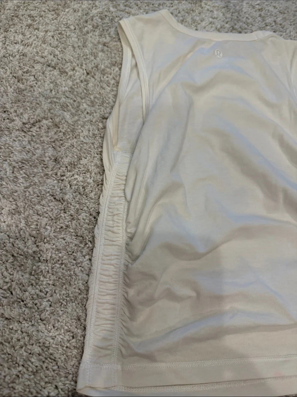 Lululemon white cinch side tank size 2. Great condition.